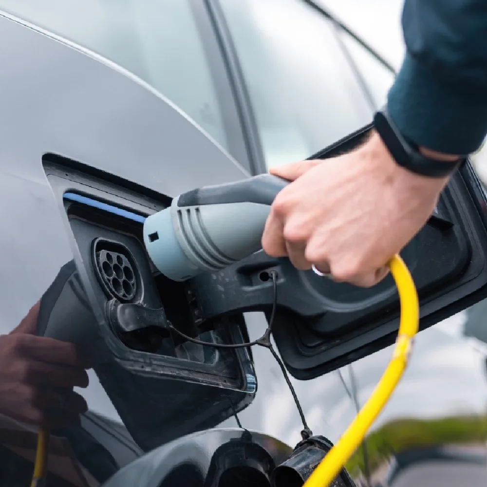 Electric vehicle charging with portable charger AB Electrical Services.